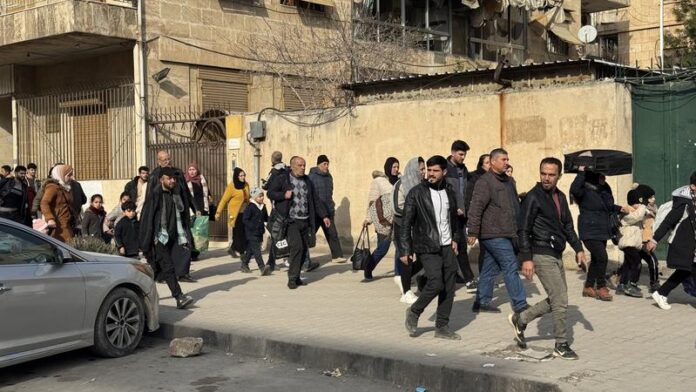 syria aleppo civilians fleeing kurdish districts